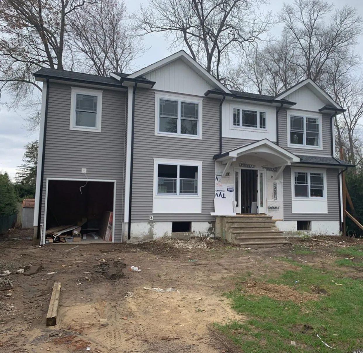 New two family build with siding and roof complete, before the landscaping went in